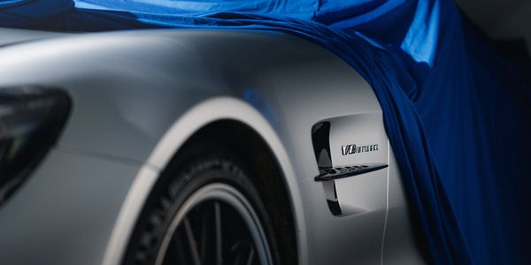 Sports car under a fitted BarnTech indoor car cover